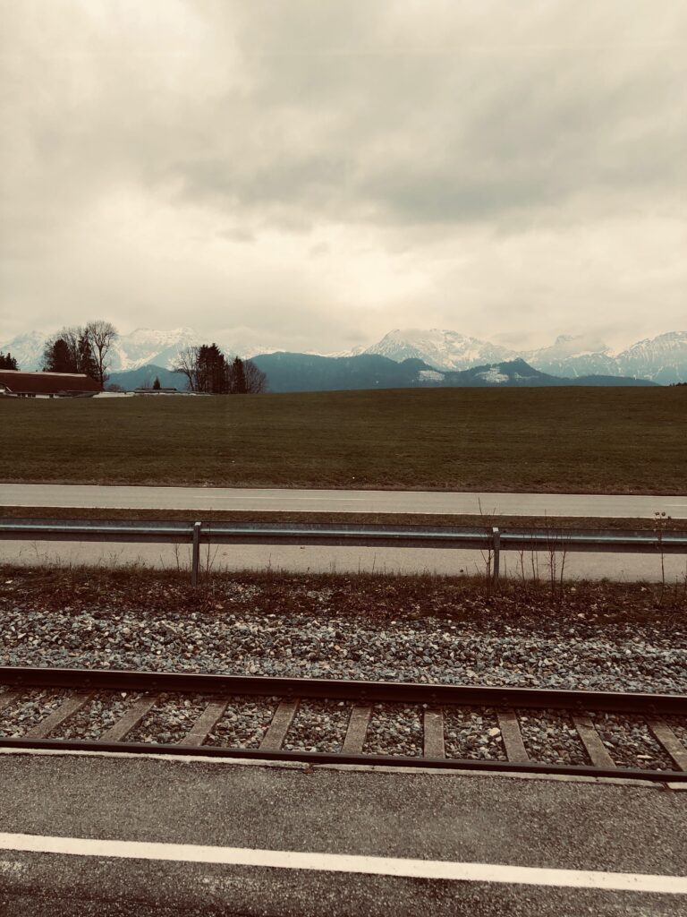 train tracks and a grey sky